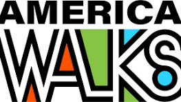 American Walks logo. America is in all black and underneath it says walks with orange, green, and blue colors around the letters.